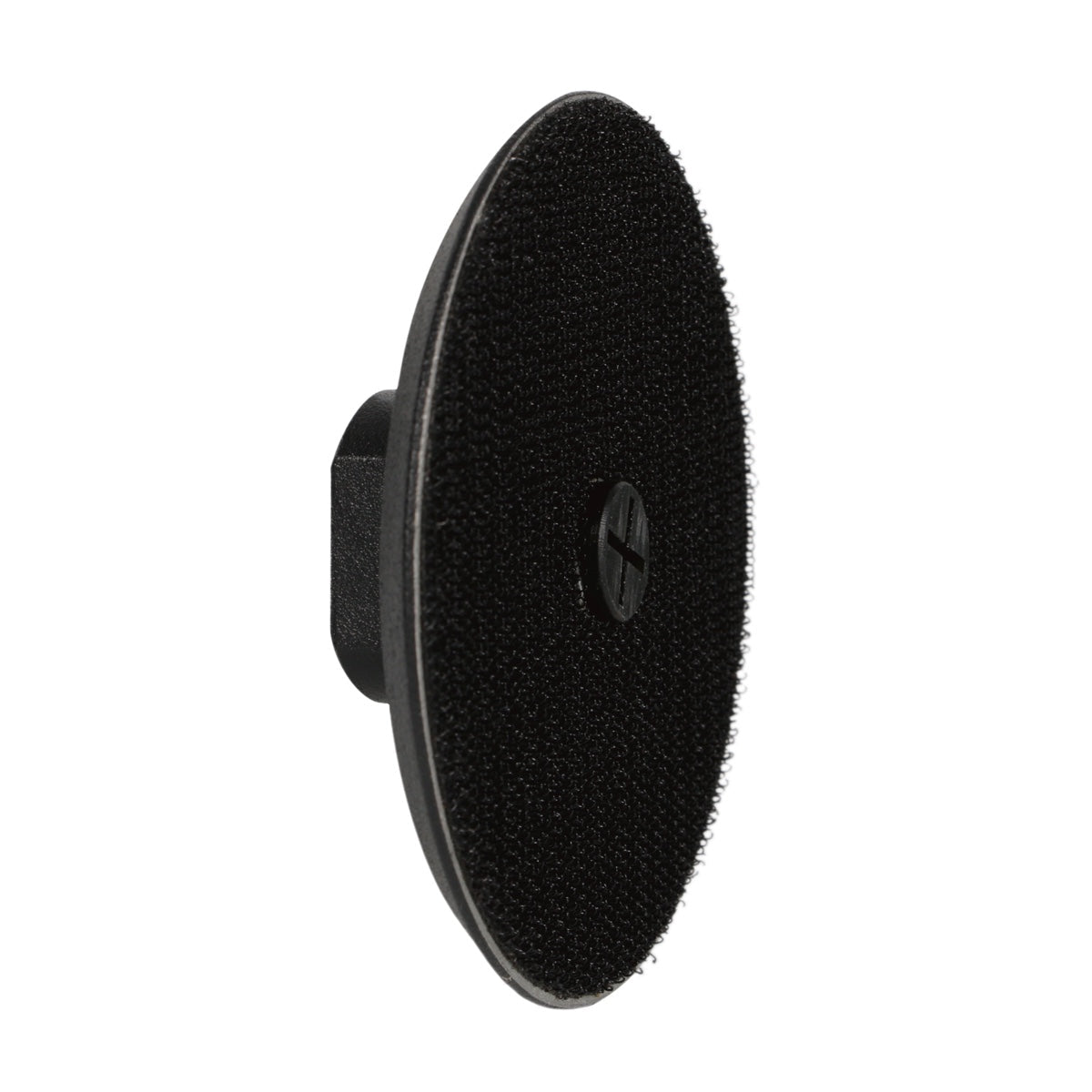 Black circular sponge pad on a white background