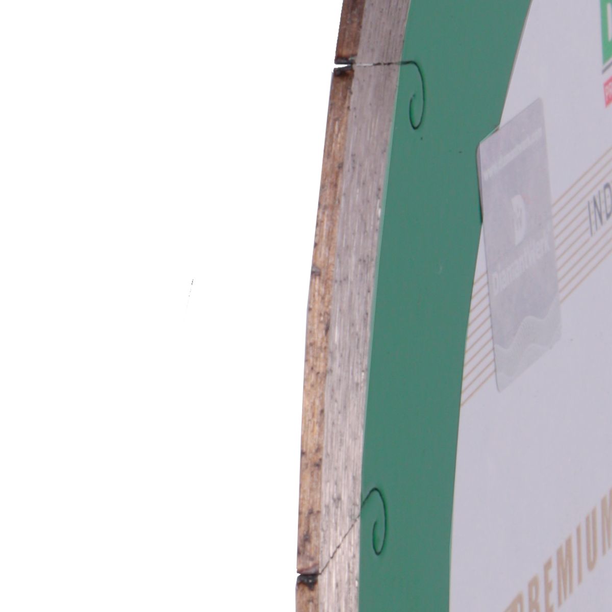 Close-up of a green and white sign with text and graphics on a wooden post.